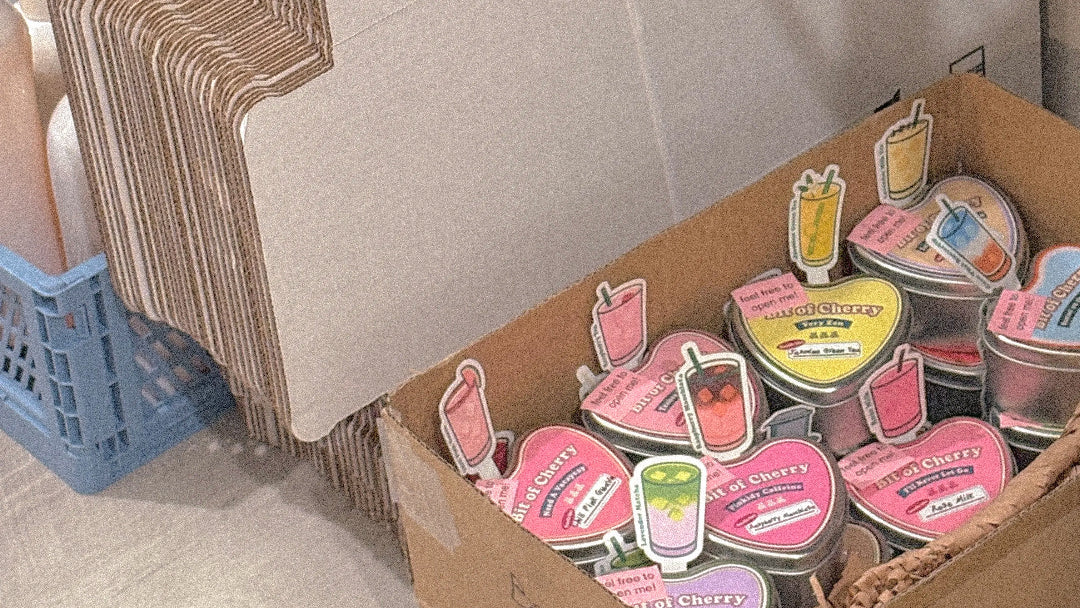 'Bit of Cherry' candles in cardboard box 