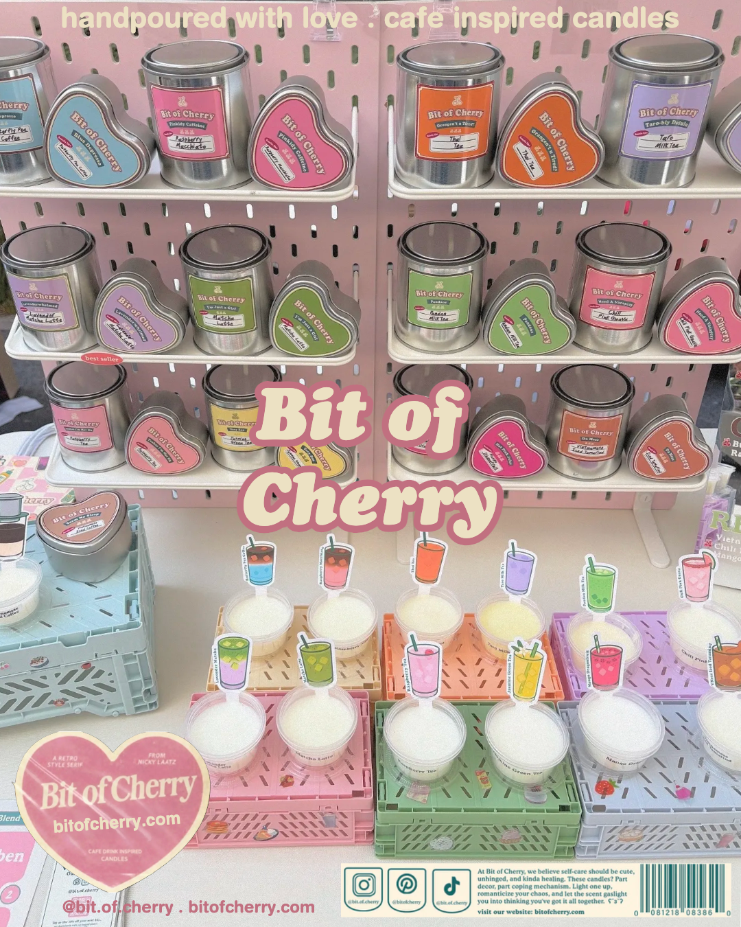 Display of 'Bit of Cherry' candles on a pink pegboard with heart-shaped containers.