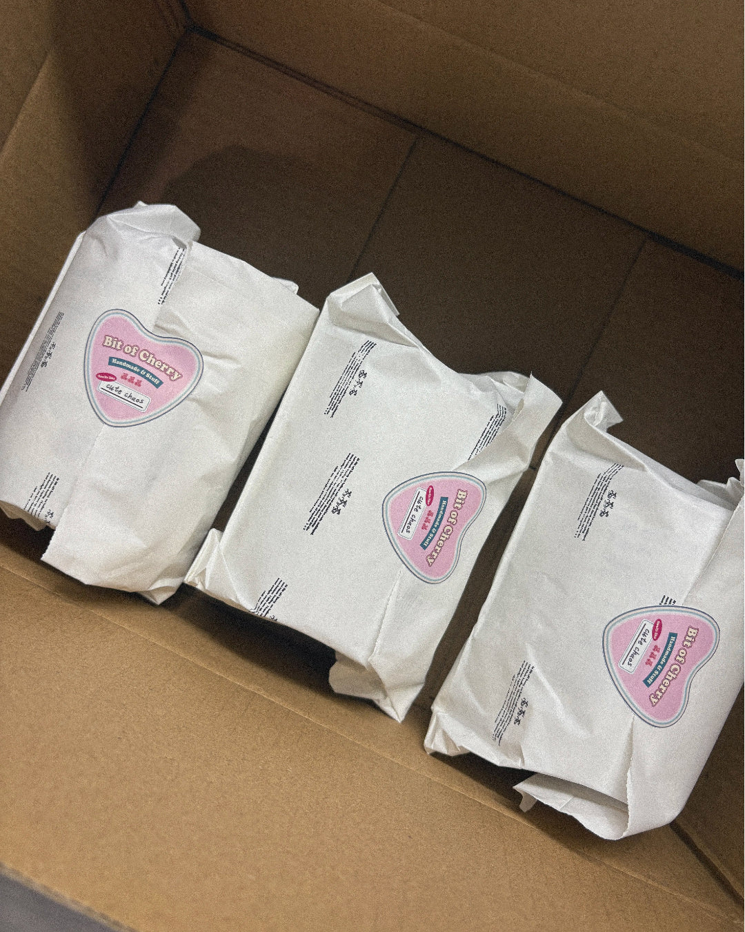 Cute aesthetic shipping packaging from Bit of Cherry using paper bags 